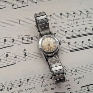 Silver Analog Watch with Gold Accents